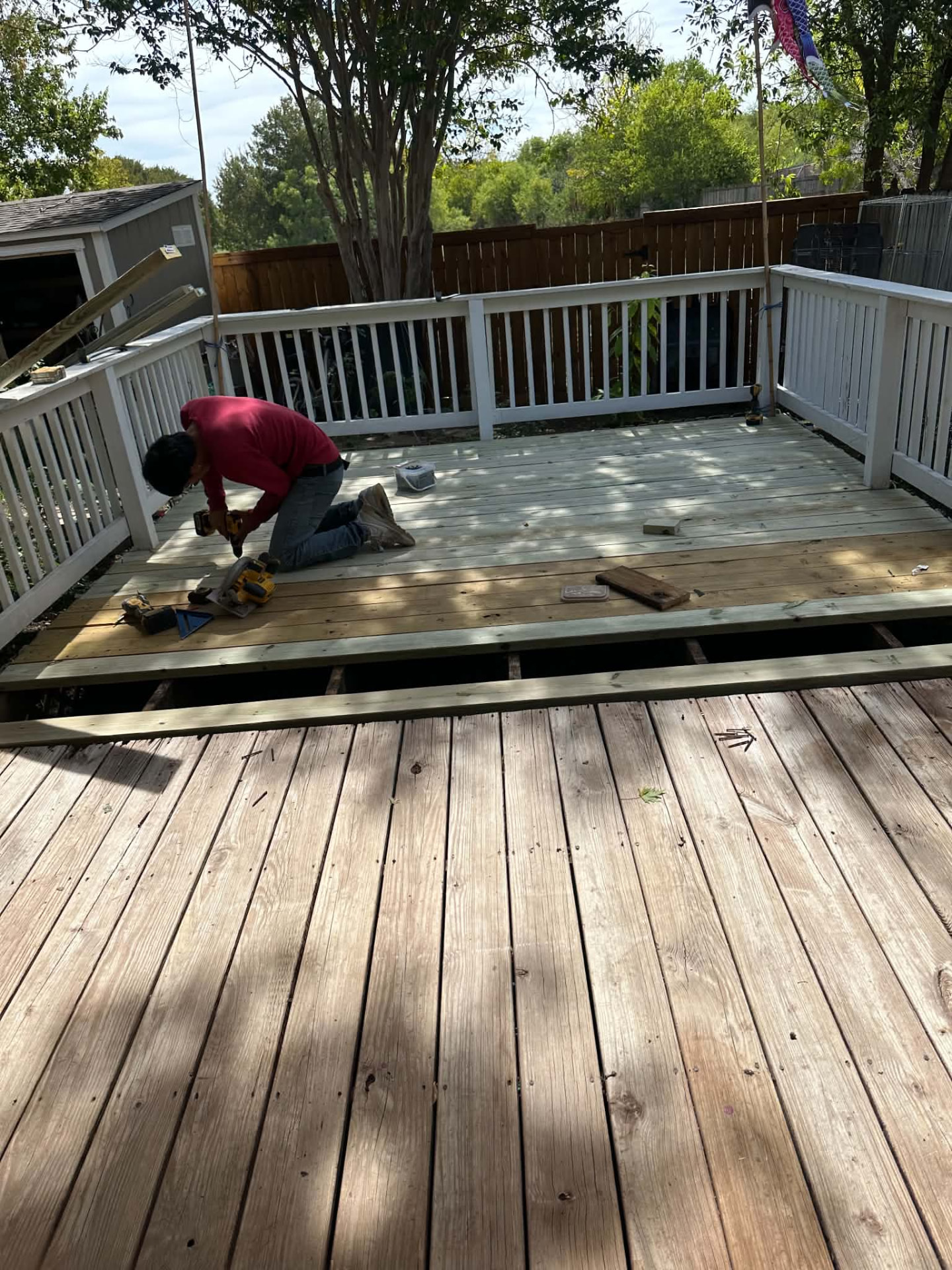 Franco crew member installing new deck boards on a San Antonio deck